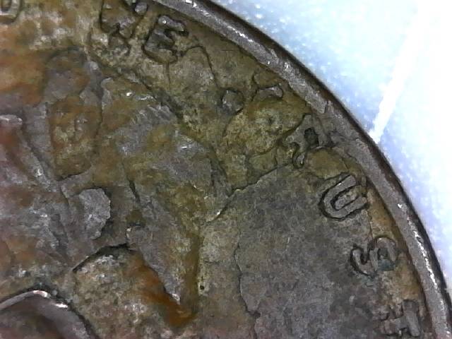 1959-D-LMC-With-Major-Damage-On-The-Obverse.