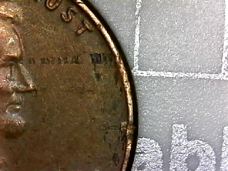 Is-It-Struck-Through-Or-Lamination-Or-Both.-1974-D-LMC