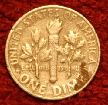 Copper-Showing-On-Reverse-Of-1980-Dime