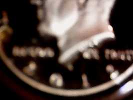 Pics-Of-My-2012-S-Silver-Proof-Set-With-1/2-Dollar-With-Something-Embedded