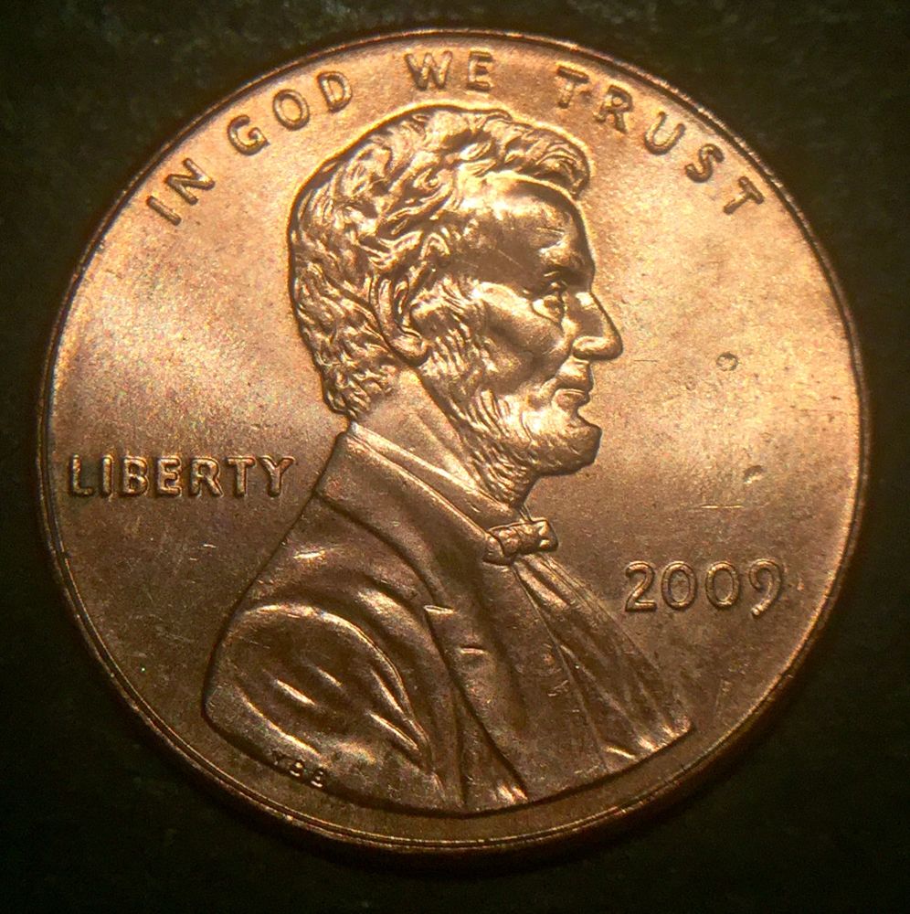2009-Lincoln-Cent-Split-On-Hand