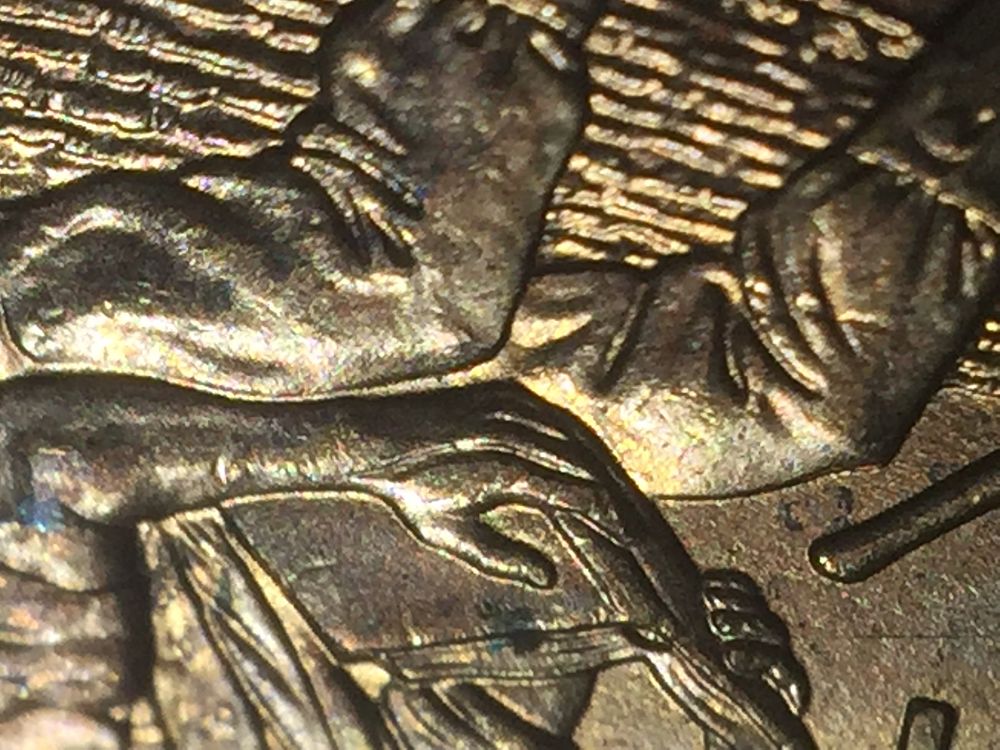 2009-Lincoln-Cent-Split-On-Hand