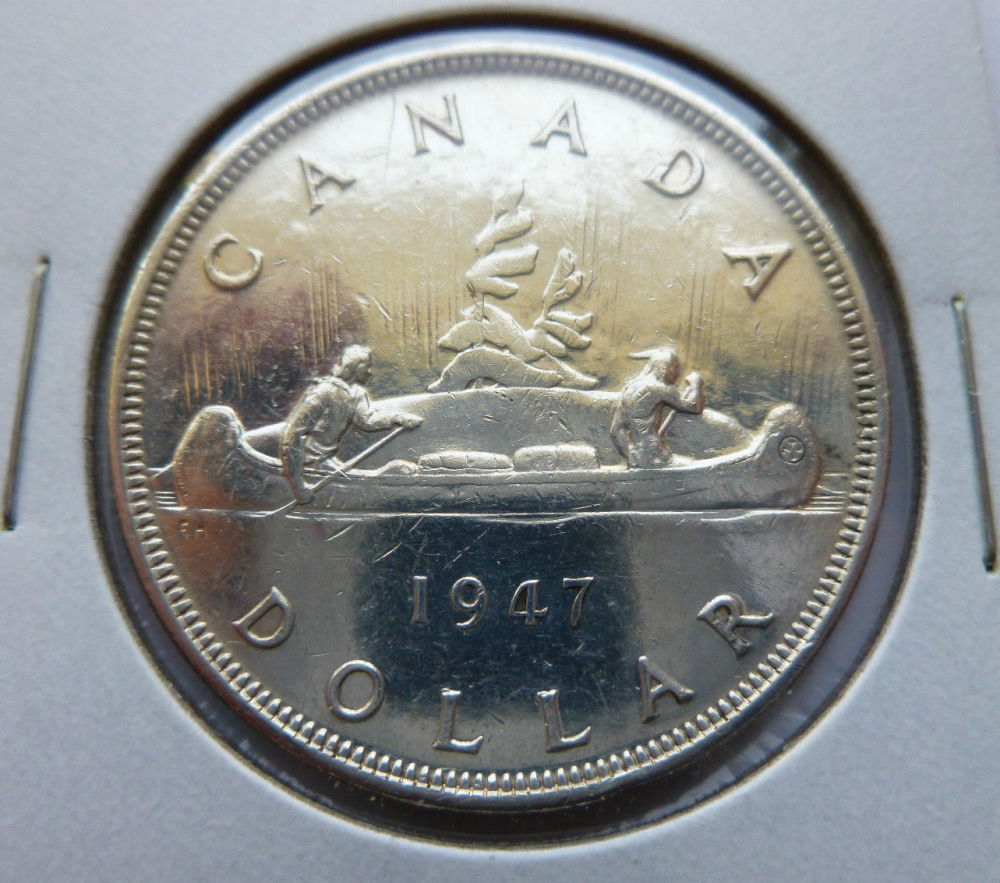 1947-Ptd-7-$1-Cleaned-Or-Not-?