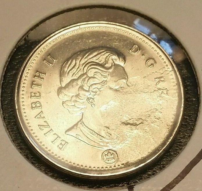 1961-Nickel-With-A-Massive-Strike-Through