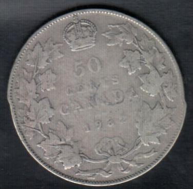 Strange-Cut-Out-Shape-For-A-1932-CDN-50-Cents-Piece