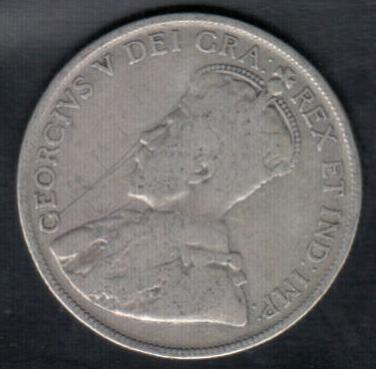 Strange-Cut-Out-Shape-For-A-1932-CDN-50-Cents-Piece
