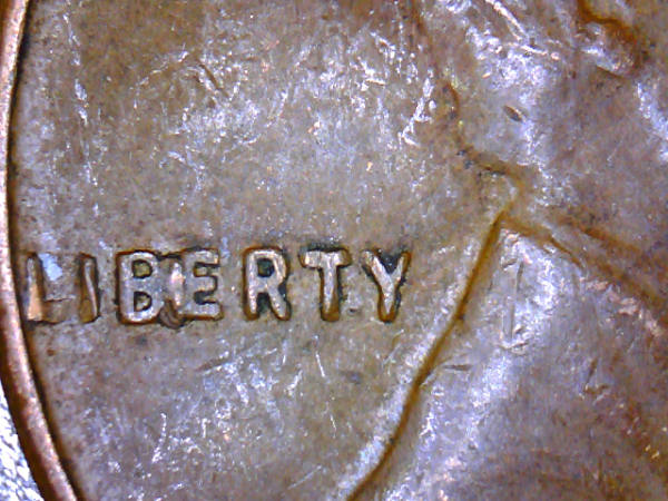 1957-Wheat-Cent-With-Problem