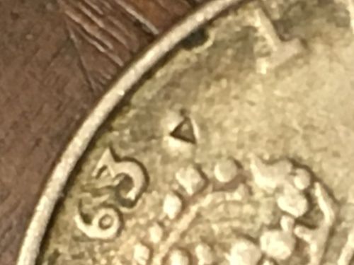 Unknown-Marking-On-A-1963-1-Kr-Swedish-Coin