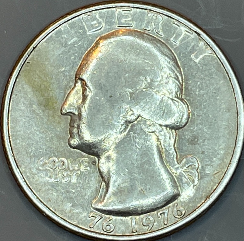 1976-D-Bicentennial-Quarter-With-Strike-Thru-Grease?