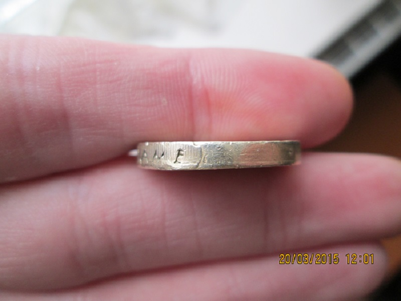 Fake-£1