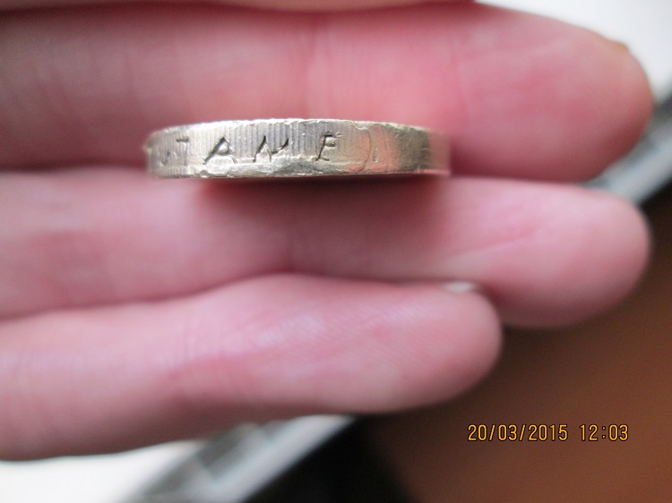 Fake-£1