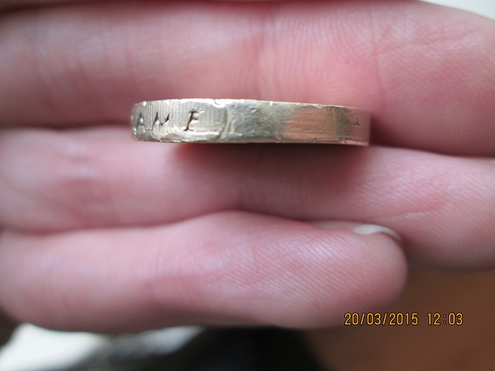 Fake-£1