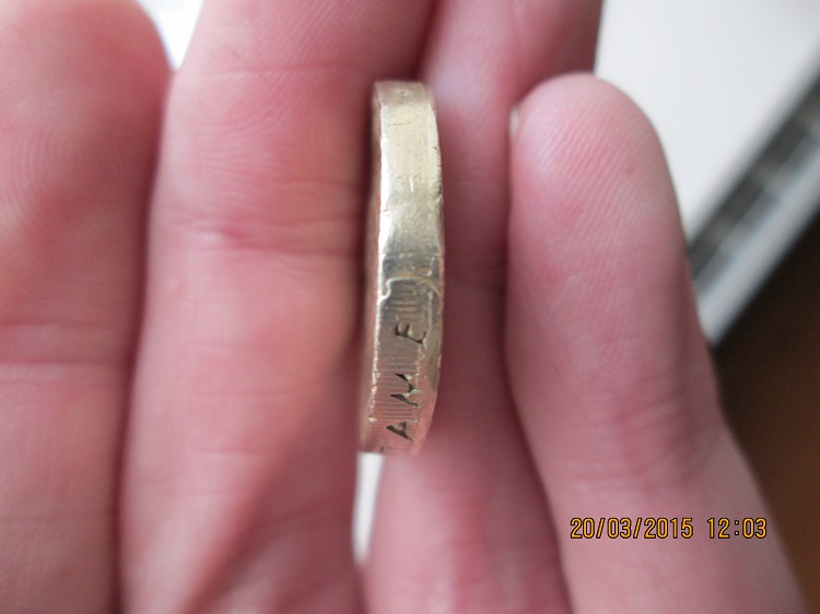 Fake-£1