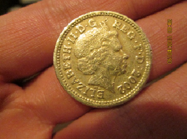 Fake-£1