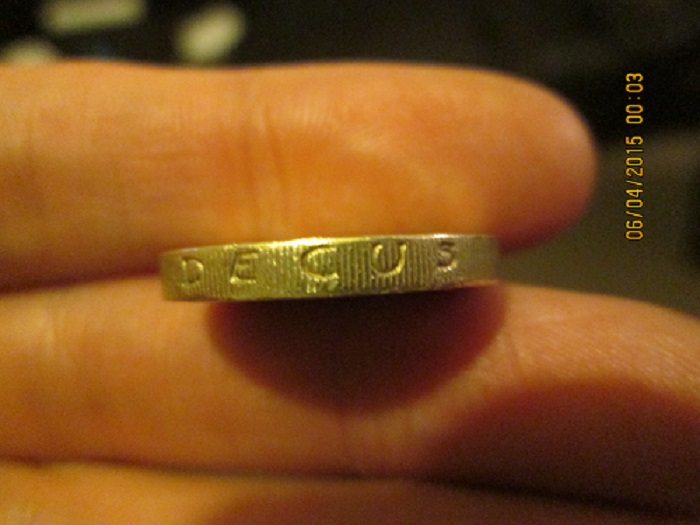 Fake-£1