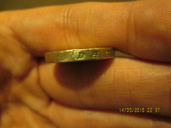 Fake-£1