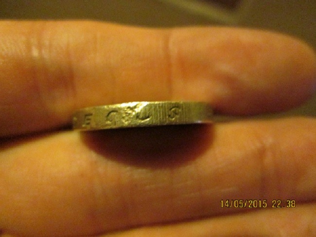 Fake-£1