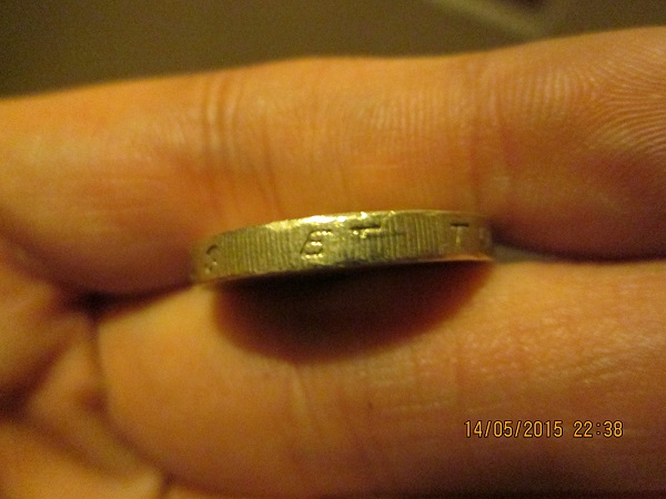 Fake-£1