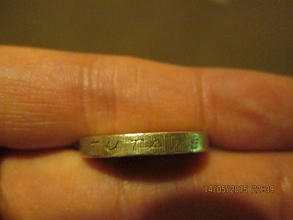 Fake-£1