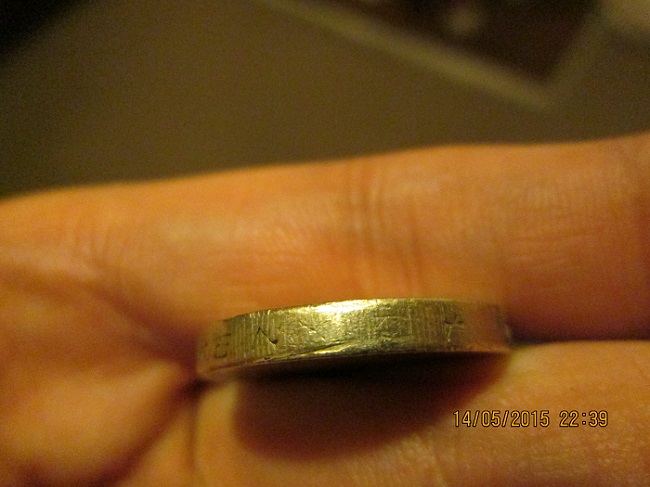 Fake-£1