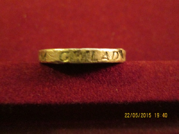 Fake-£1
