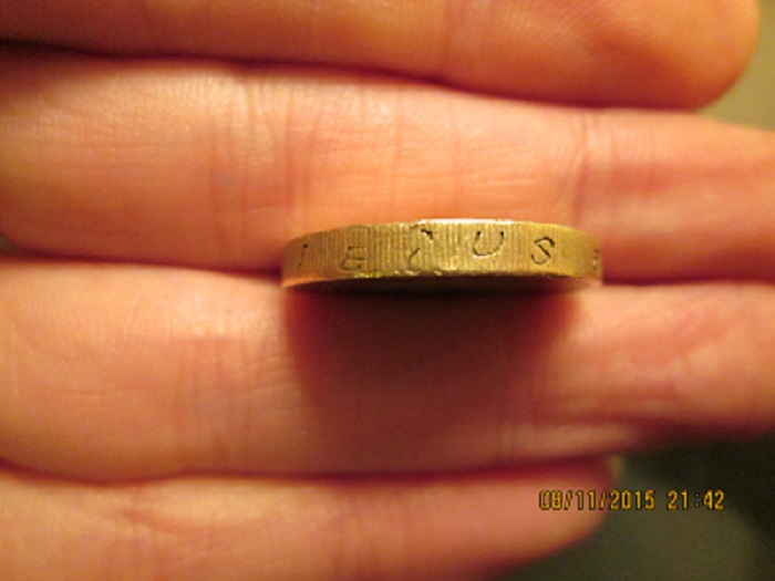 Fake-£1