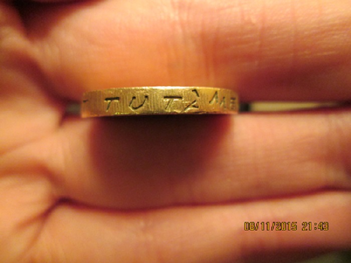 Fake-£1