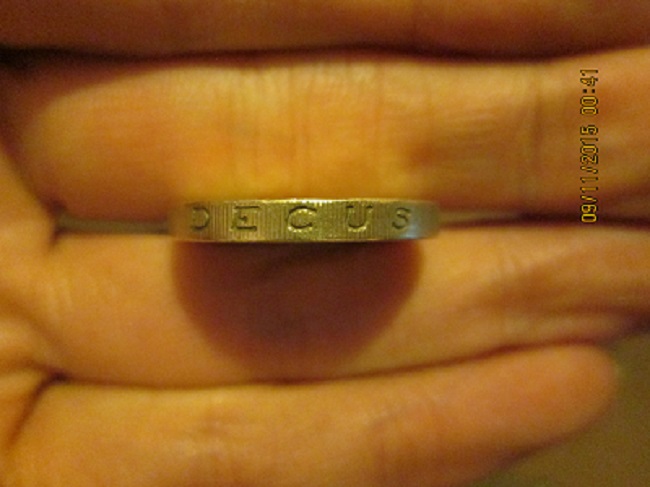 Fake-£1