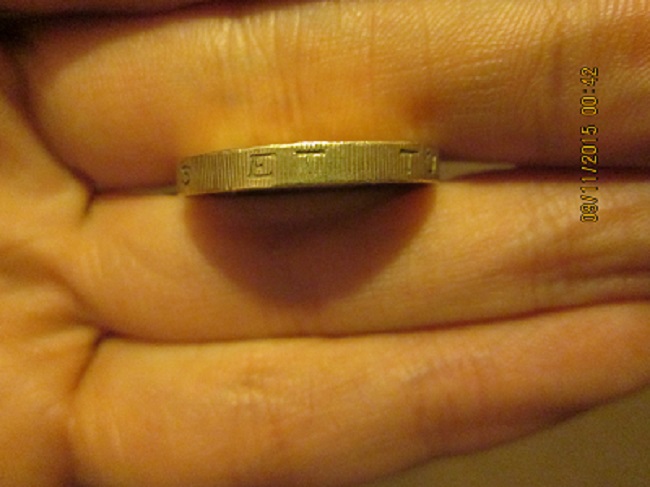 Fake-£1