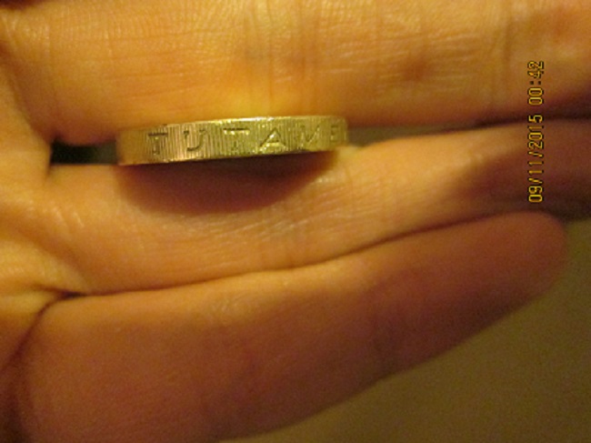 Fake-£1