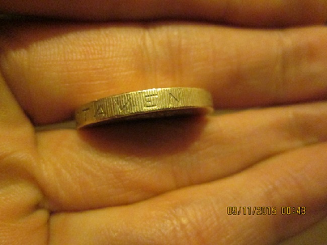 Fake-£1
