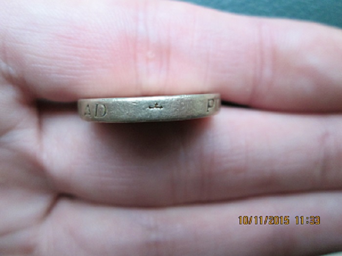 Fake-£1