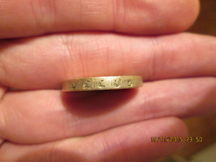 Fake-£1