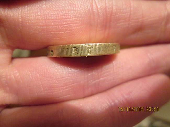 Fake-£1