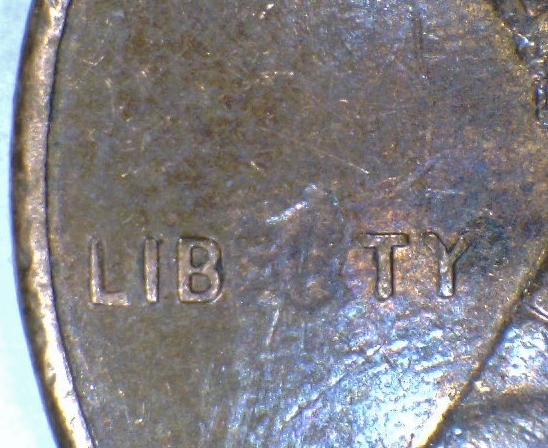 1997-Lincoln-Cent-Missing-Letters-/-Patch-In-Head?