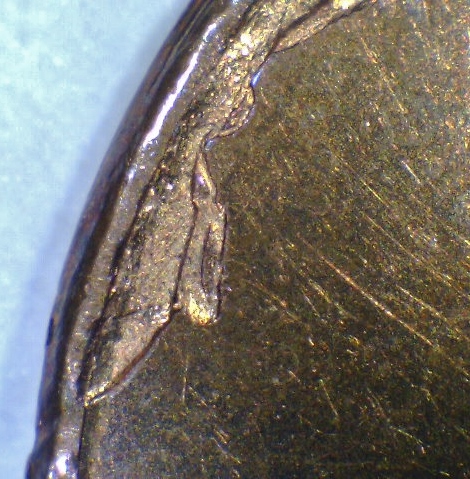 2012-LMC---Struck-Through-Planchet-Flaw-?