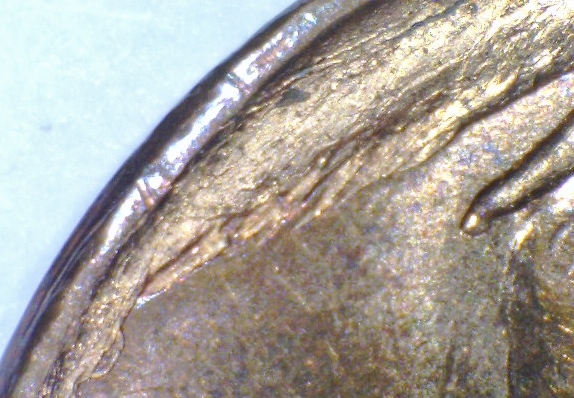 2012-LMC---Struck-Through-Planchet-Flaw-?