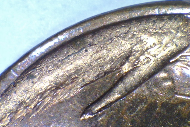 2012-LMC---Struck-Through-Planchet-Flaw-?