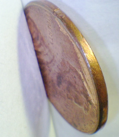 2012-LMC---Struck-Through-Planchet-Flaw-?