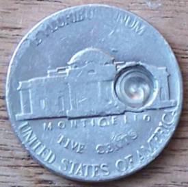 1975-D-Nickel-Mint-Damage-Or-PMD