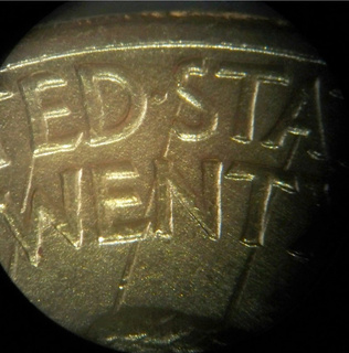 1909-$20.00-Gold-Coin,-Help-W/-Grade