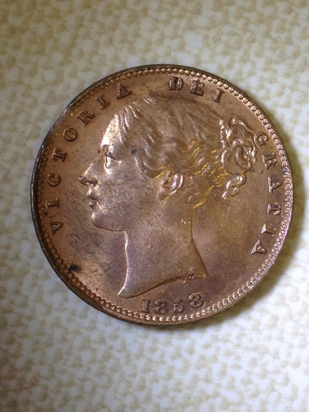 Clipped-Planchet-On-British-Farthing