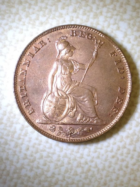 Clipped-Planchet-On-British-Farthing