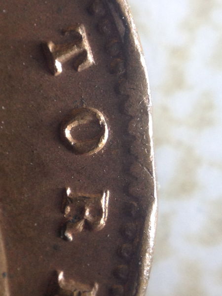 Clipped-Planchet-On-British-Farthing