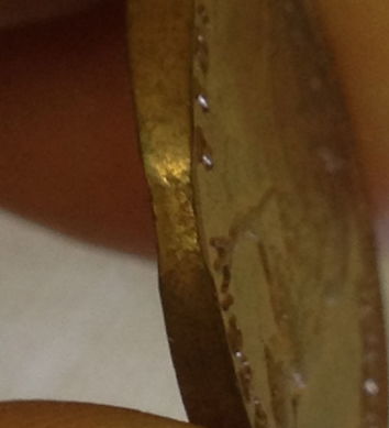 Clipped-Planchet-On-British-Farthing