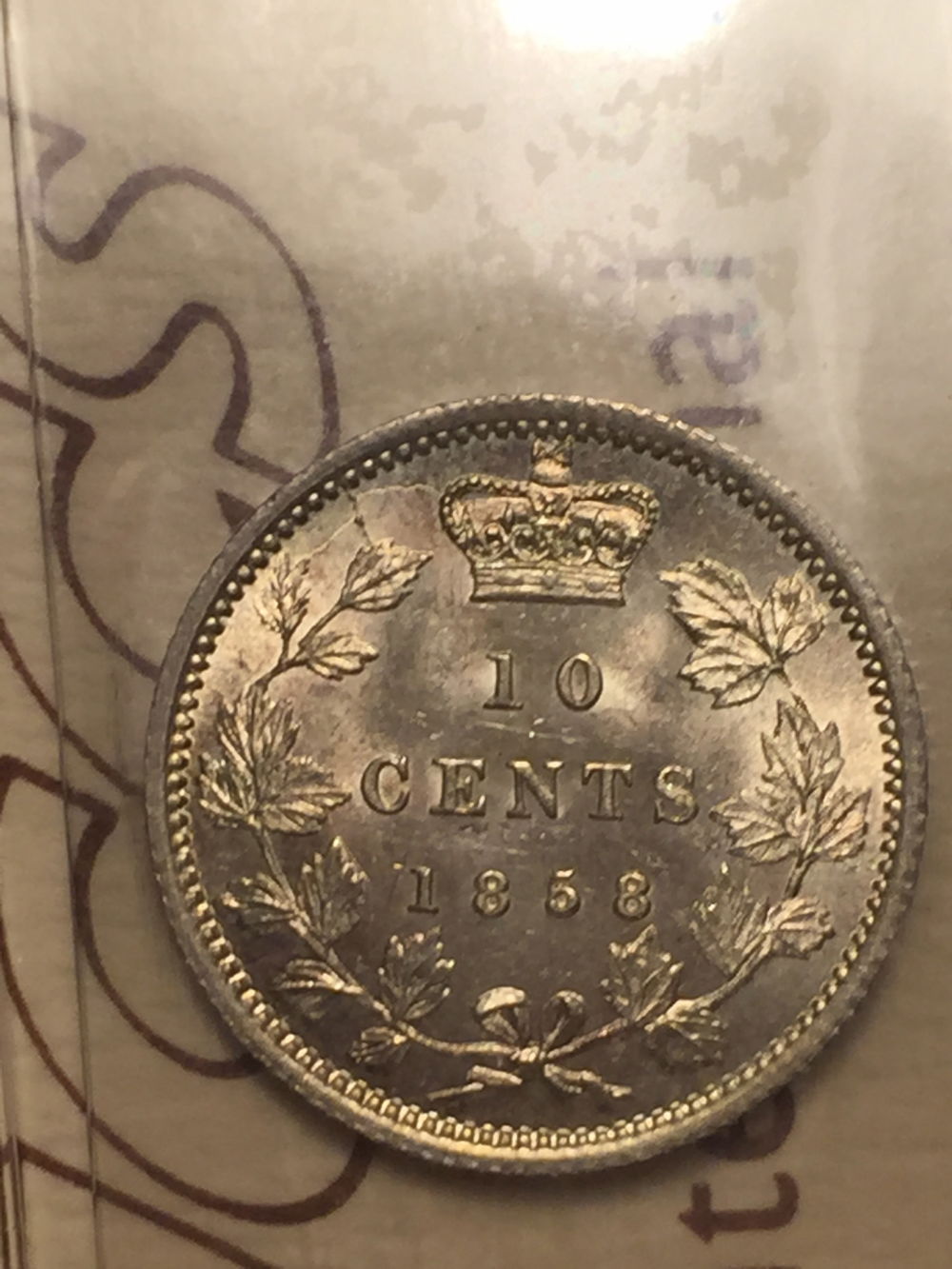 1858-Dime-With-A-Re-Cut-Neck-Line.