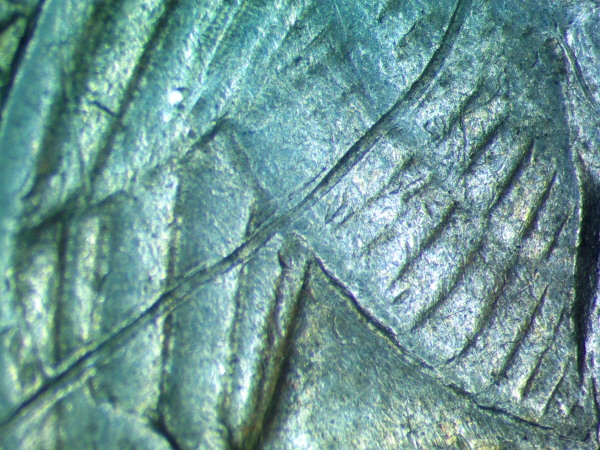 2014-D-Quarter-With--Struck-Thu-With-Wire