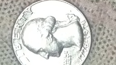 1976-Bi-Centennial-Quarter.-Stars-Appear-Close-Near-United.