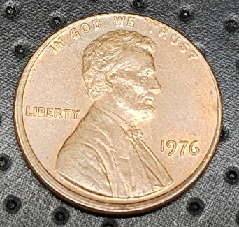 1976-Penny-Off-Center-Strike