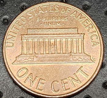 1976-Penny-Off-Center-Strike
